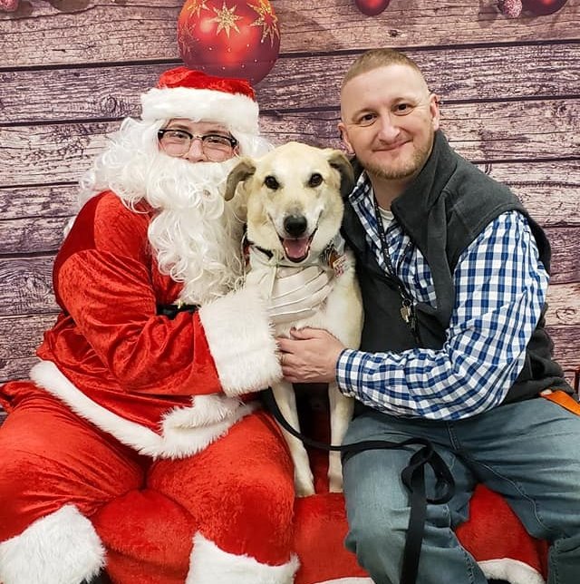 Photo of Corey and Kodie with Santa